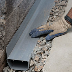 installing a drain tile system in a  home