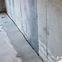 an ugly basement weeping tile drainage system that's clogged and not working in Carpinteria.