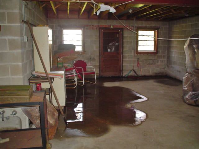 A Flooded Basement Floor In A Home a flooded basement floor in a home