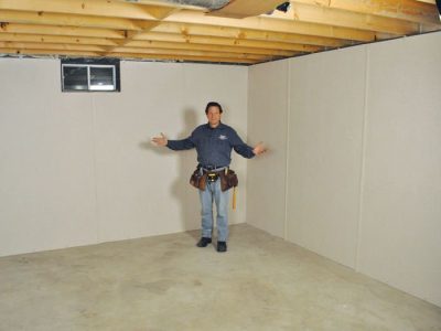 Moorpark basement insulation covered by EverLast™ wall paneling, with SilverGlo™ insulation underneath