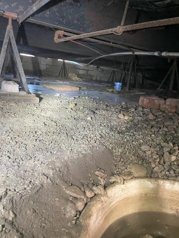 (Left) Standing water - discoloration (blue, green and brow) occurring through out crawlspace.