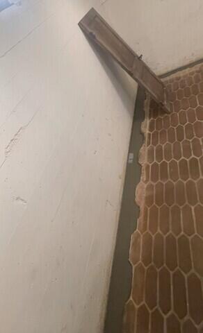 After water guard has been installed and sealed with cement. (Close up)