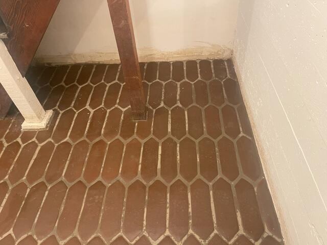 Basement after all the water was removed and dried down. Another Angle under the steeps into the basement.