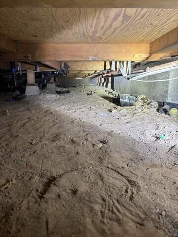 Our Client's crawlspace before we entered and prepared for the CleanSpace