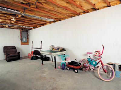 Bright white plastic basement wall covering